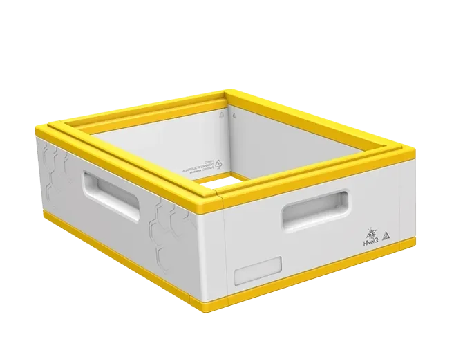 EPS bee hive box with white body and yellow edges, featuring built-in handles and honeycomb pattern