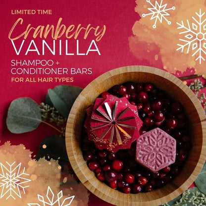 EPS bee hive shaped cranberry vanilla shampoo and conditioner bars in wooden bowl with cranberries