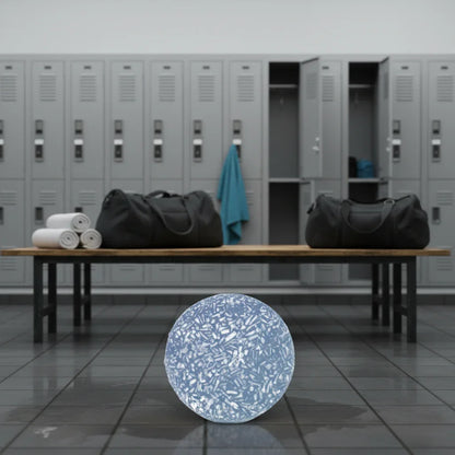 eps bee hive shaped men's blend shampoo bar in a gym locker room with bags and towels